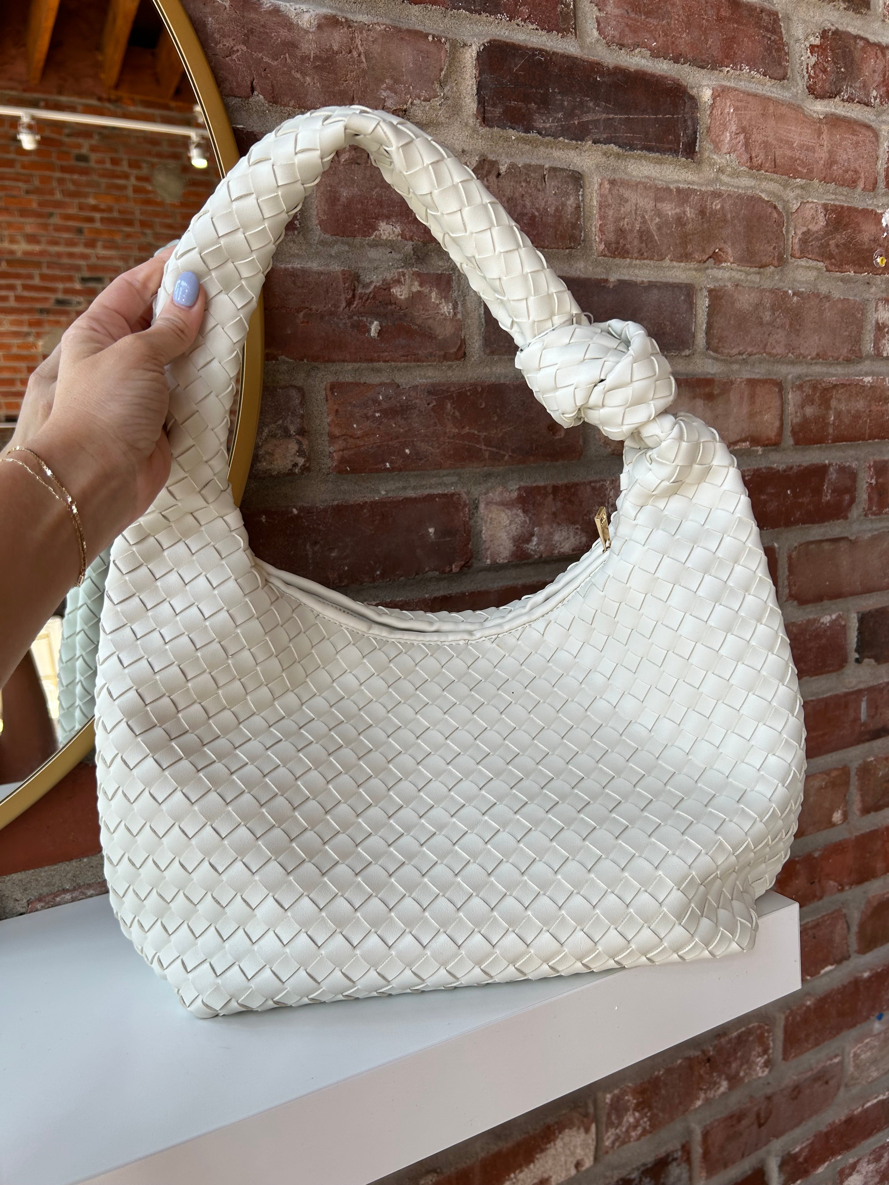 Zara Woven Handbag - Cream with a textured woven design, knotted handle, and zip closure for a stylish and versatile look.