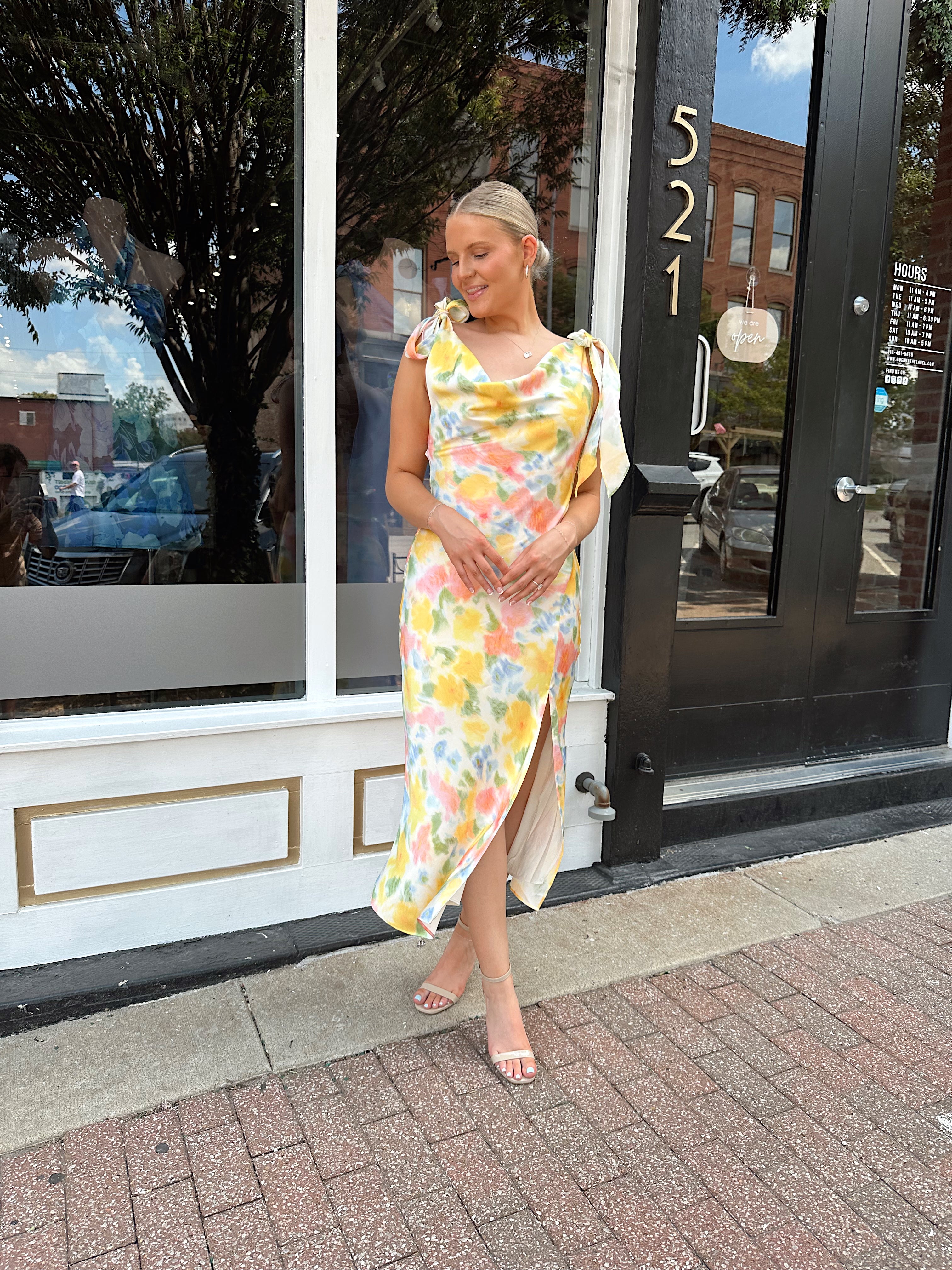 Yellow multicolor floral satin midi dress with self tie straps and cowl neck.