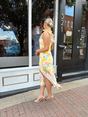 Yellow multicolor floral satin midi dress with self tie straps and cowl neck.