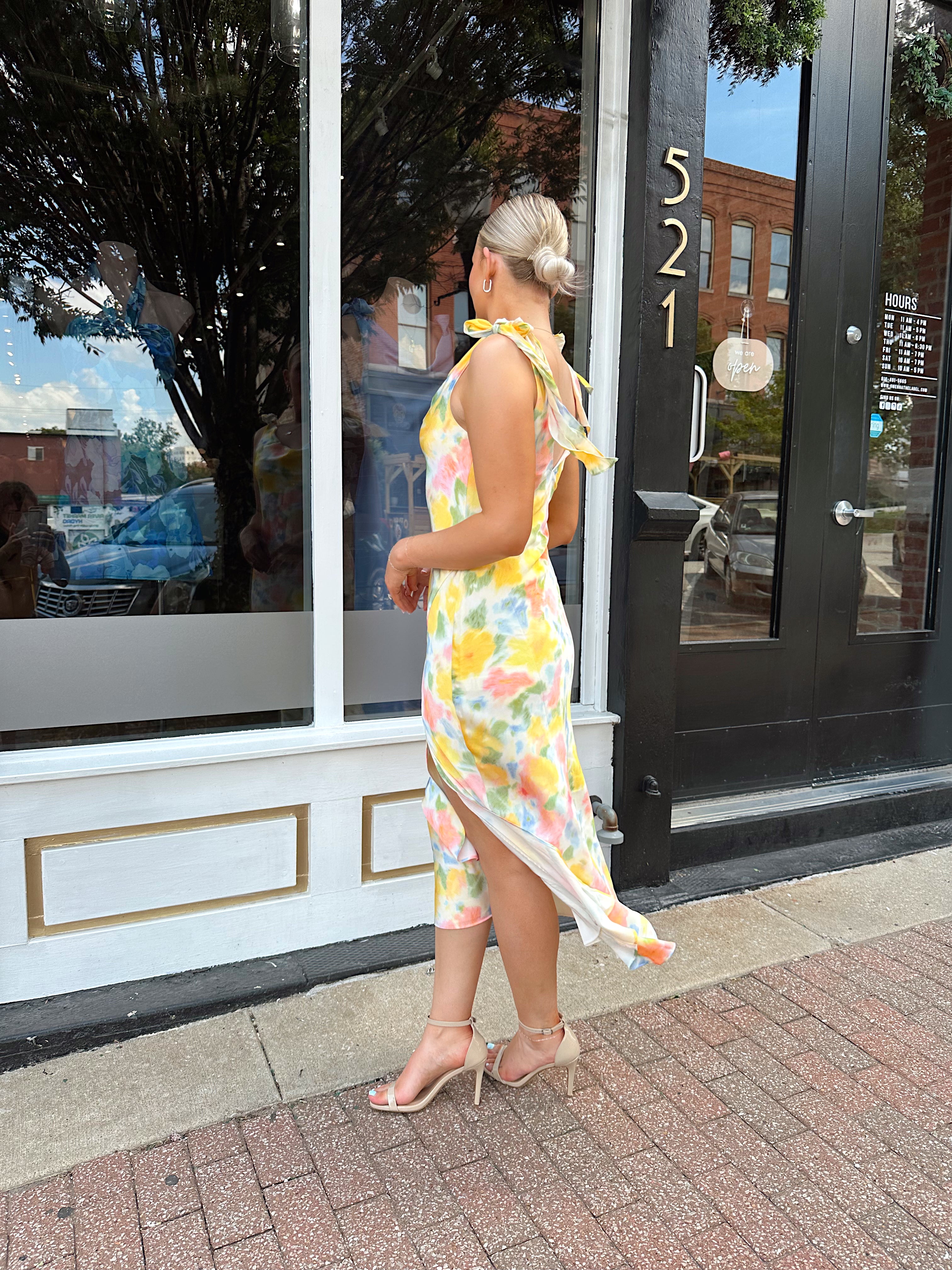 Yellow multicolor floral satin midi dress with self tie straps and cowl neck.