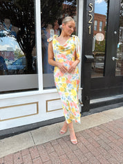 Yellow multicolor floral satin midi dress with self tie straps and cowl neck.