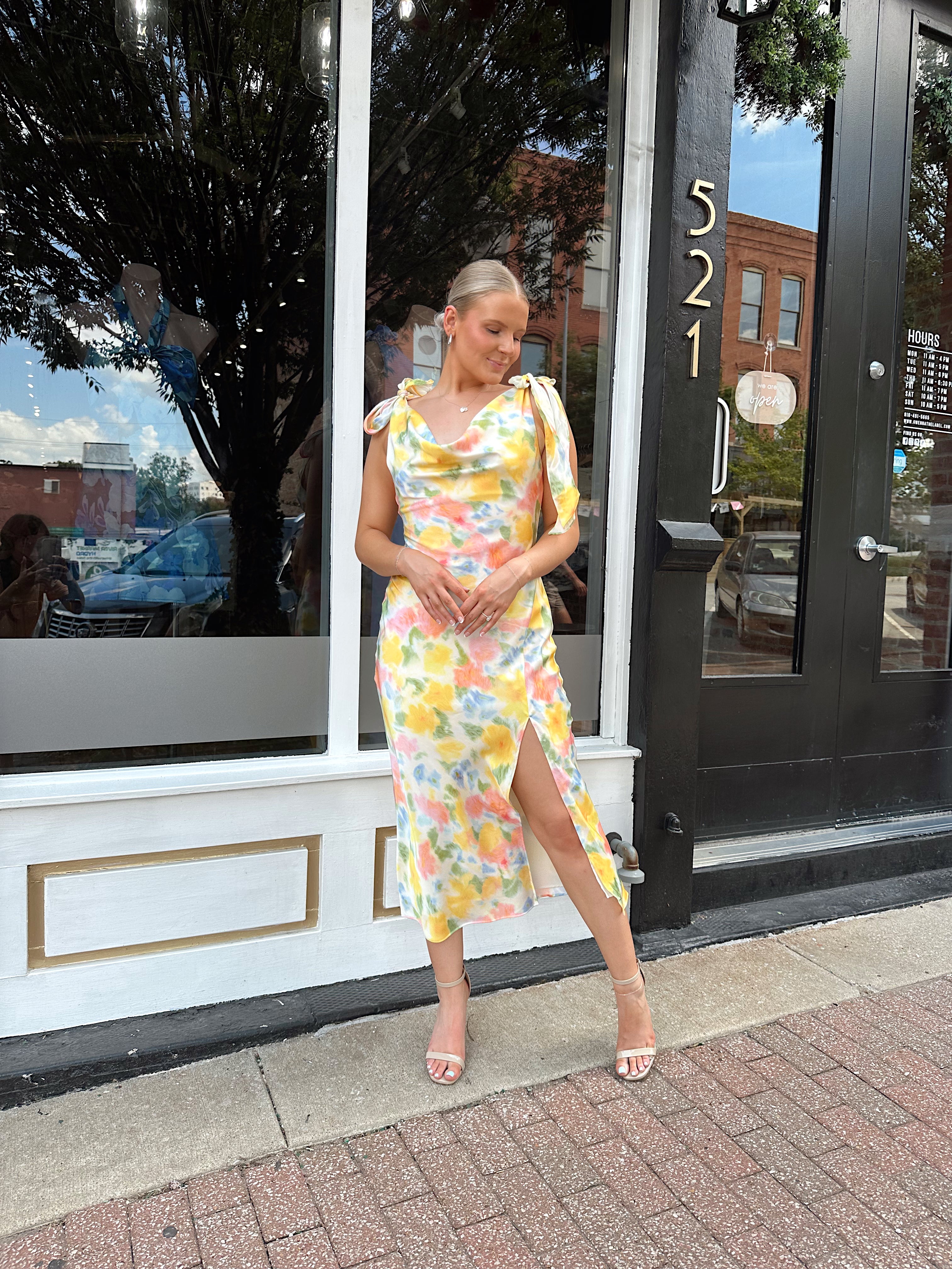 Yellow multicolor floral satin midi dress with self tie straps and cowl neck.