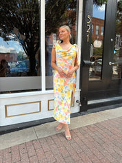 Yellow multicolor floral satin midi dress with self tie straps and cowl neck.