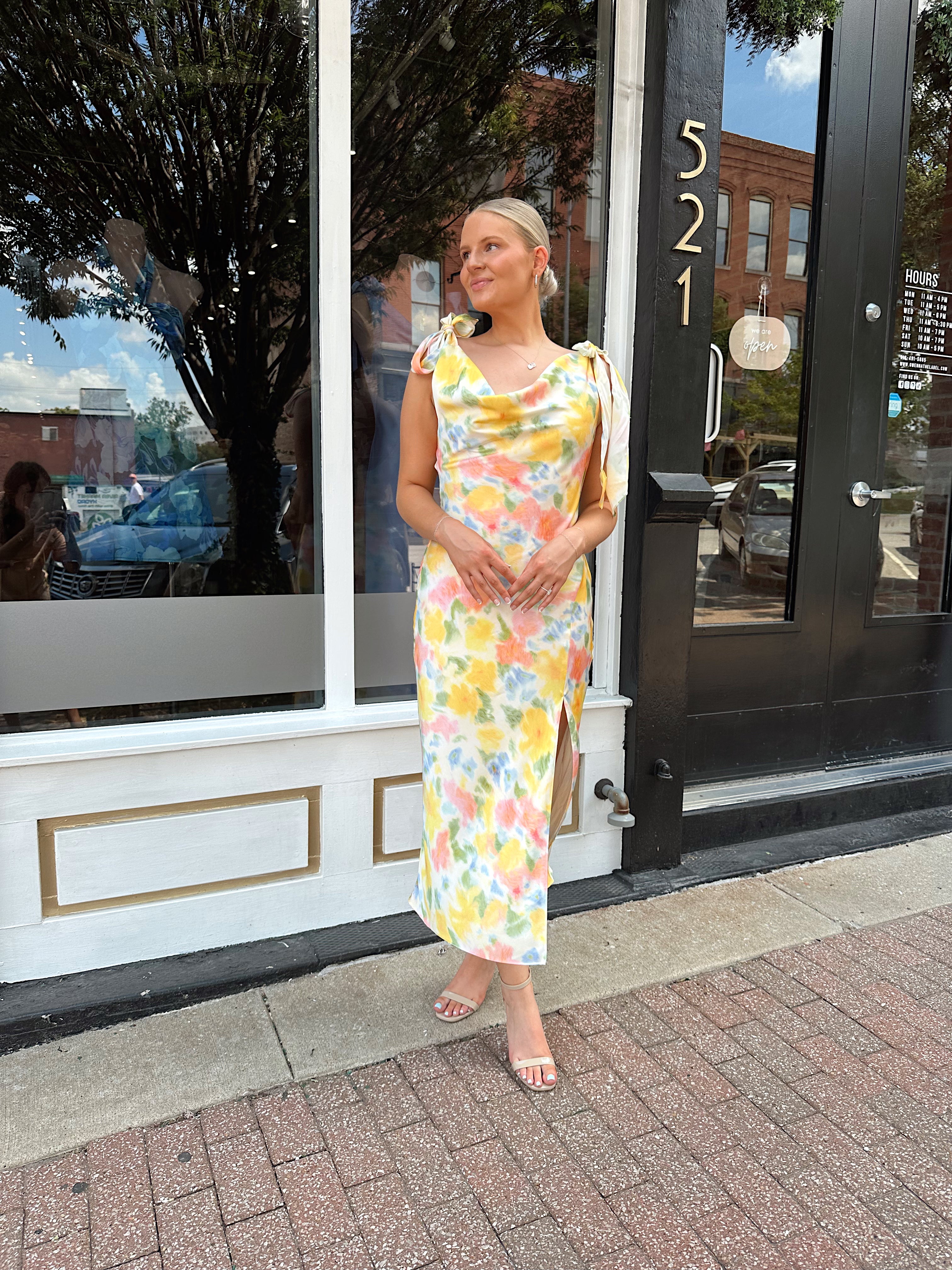 Yellow multicolor floral satin midi dress with self tie straps and cowl neck.