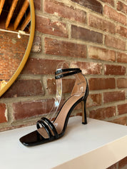 Black patent open toe heel with double front straps and ankle buckle closure