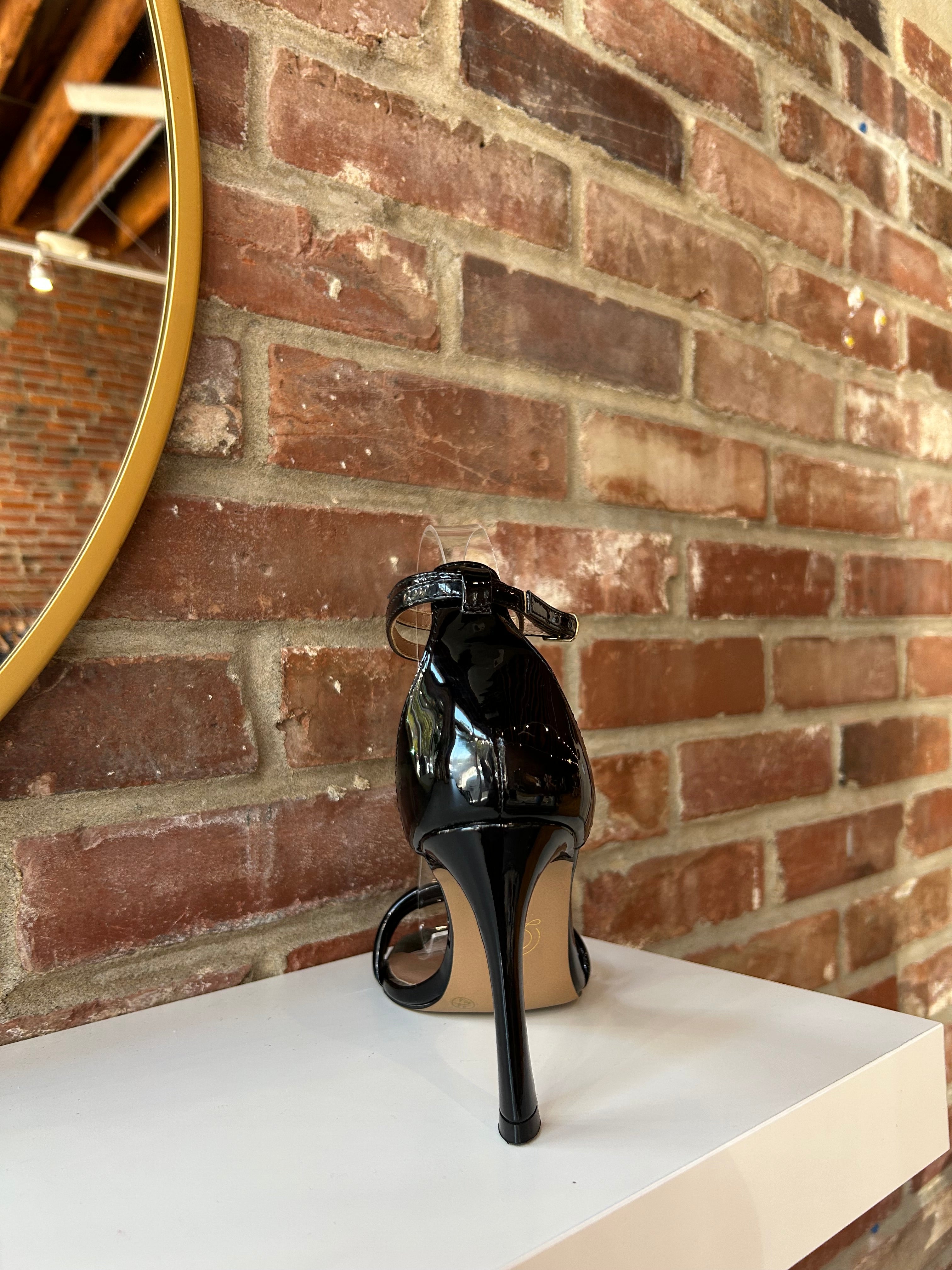 Black patent open toe heel with double front straps and ankle buckle closure