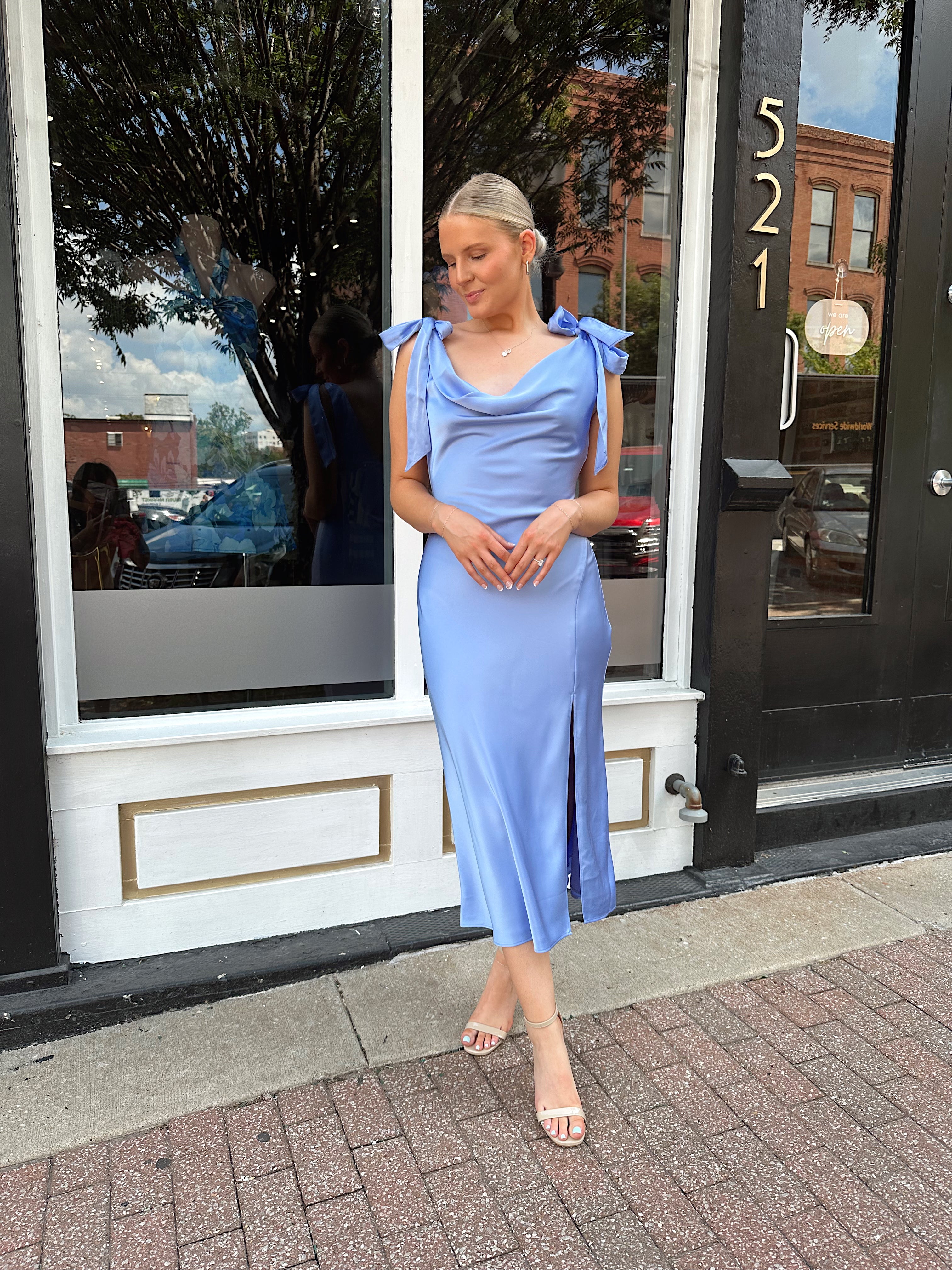 Sky blue satin midi dress with self tie straps and cowl neckline. 