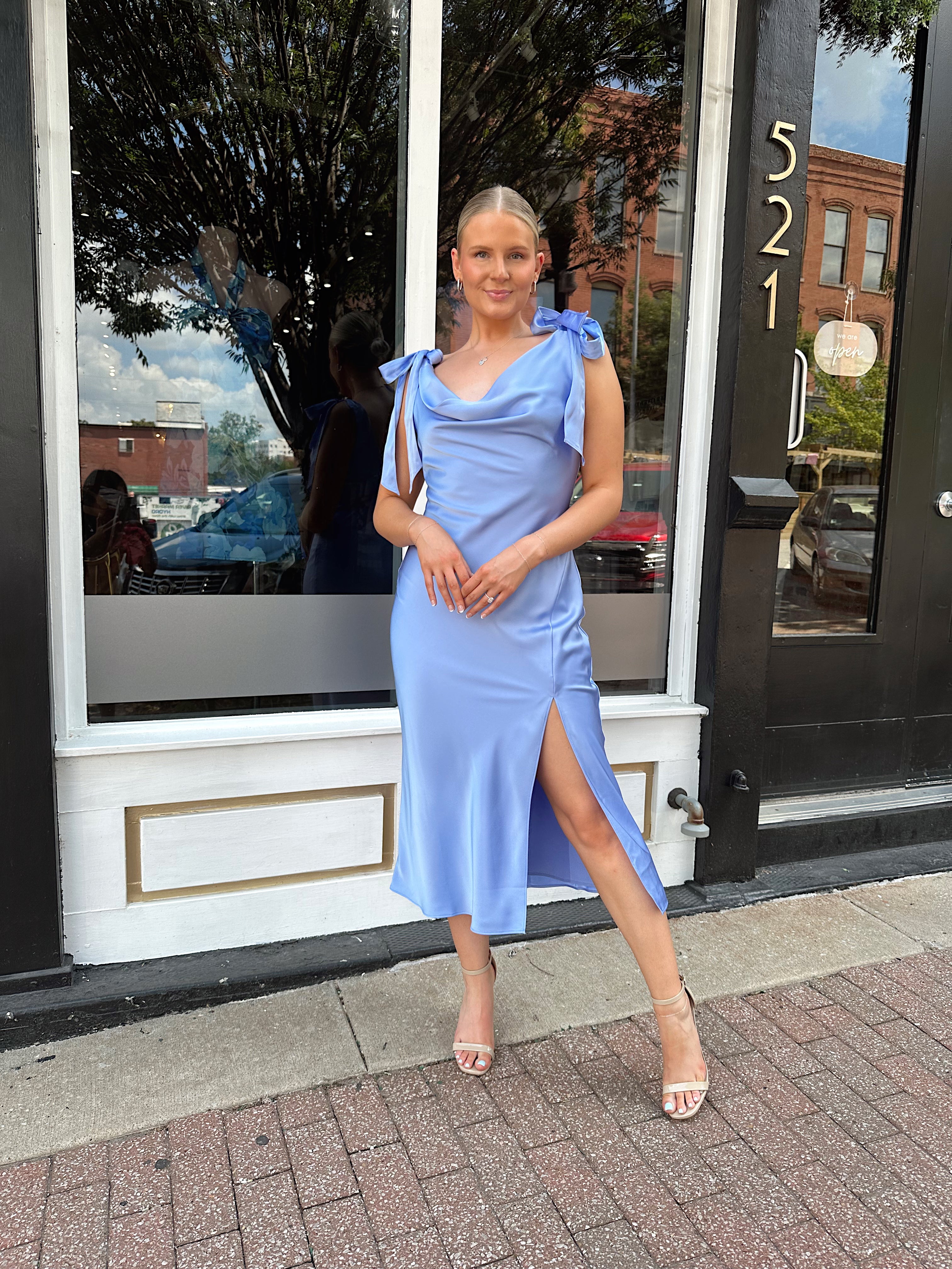 Sky blue satin midi dress with self tie straps and cowl neckline. 