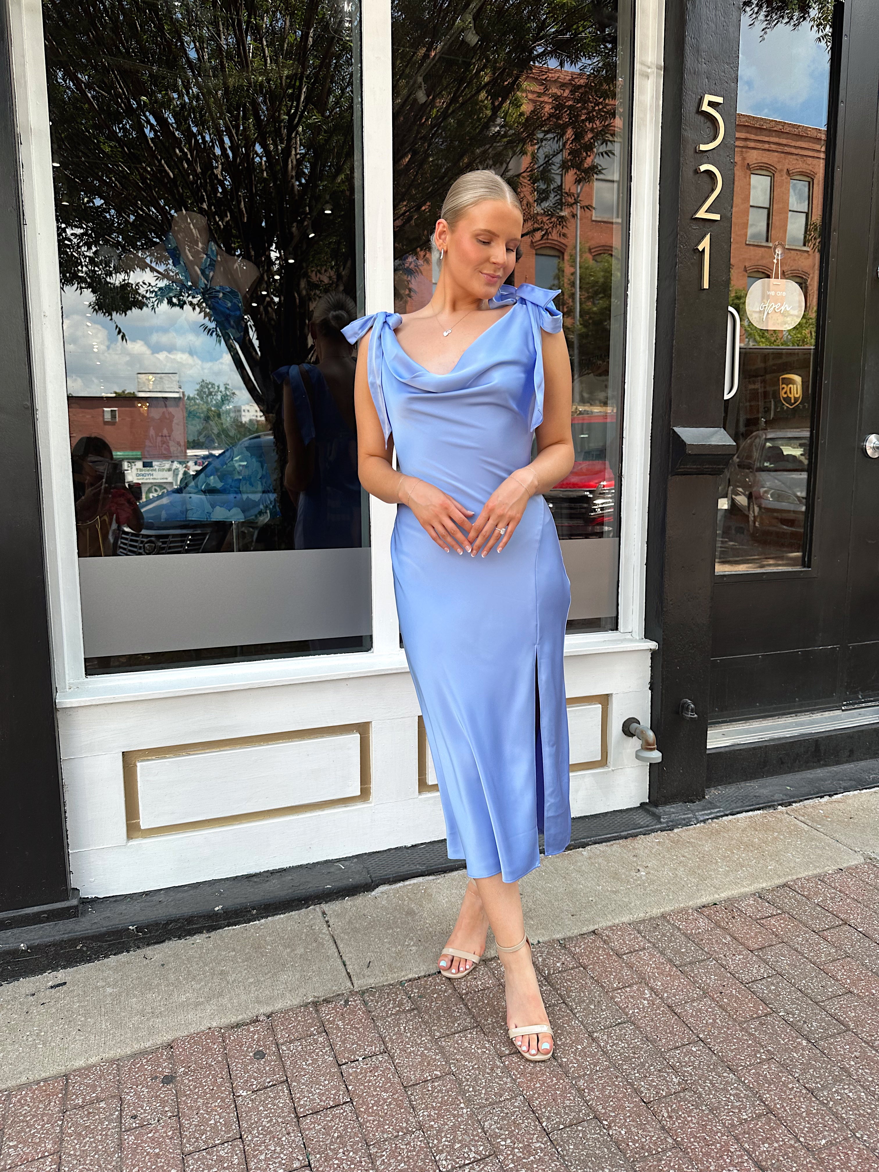 Sky blue satin midi dress with self tie straps and cowl neckline. 