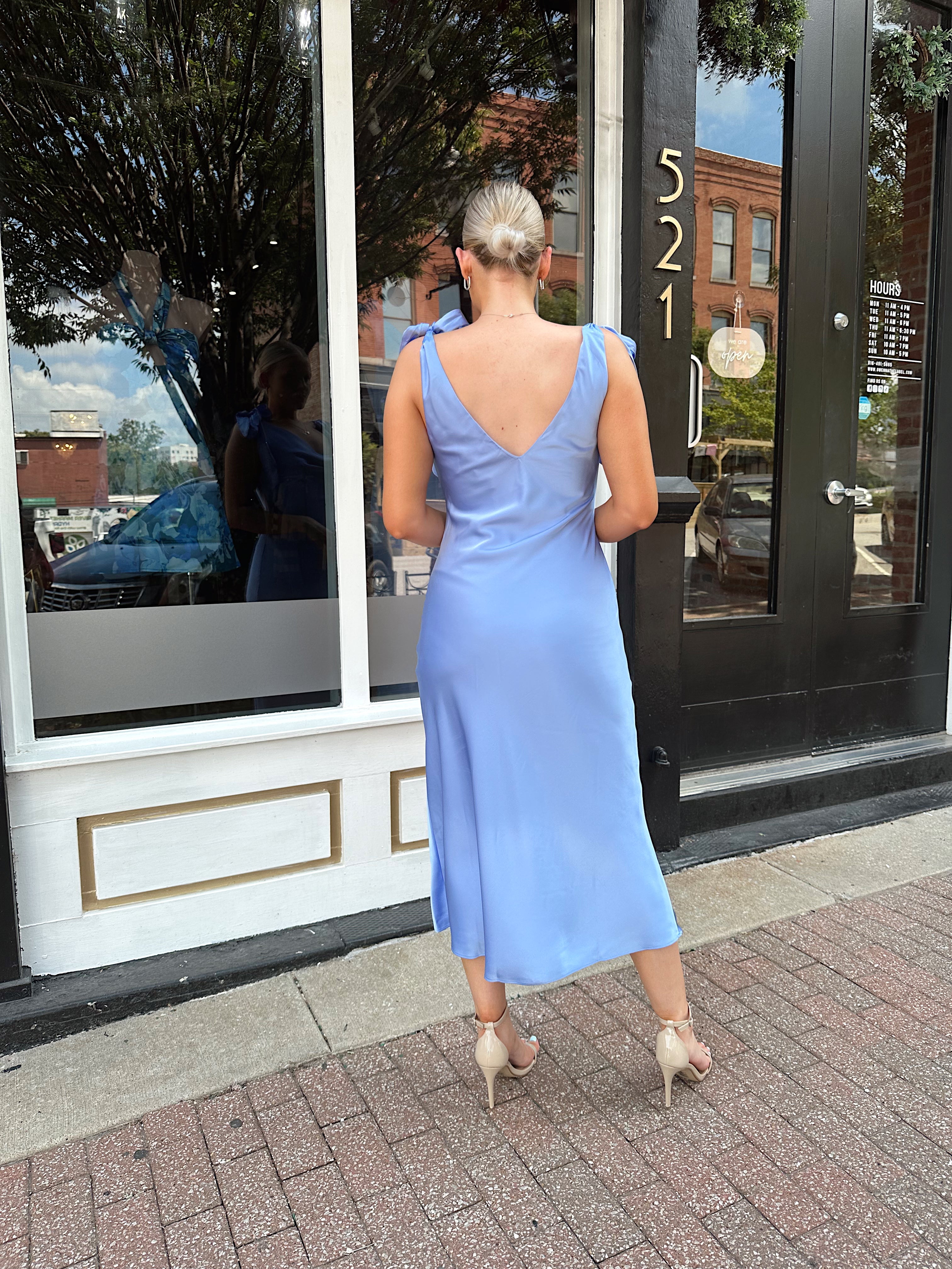 Sky blue satin midi dress with self tie straps and cowl neckline. 