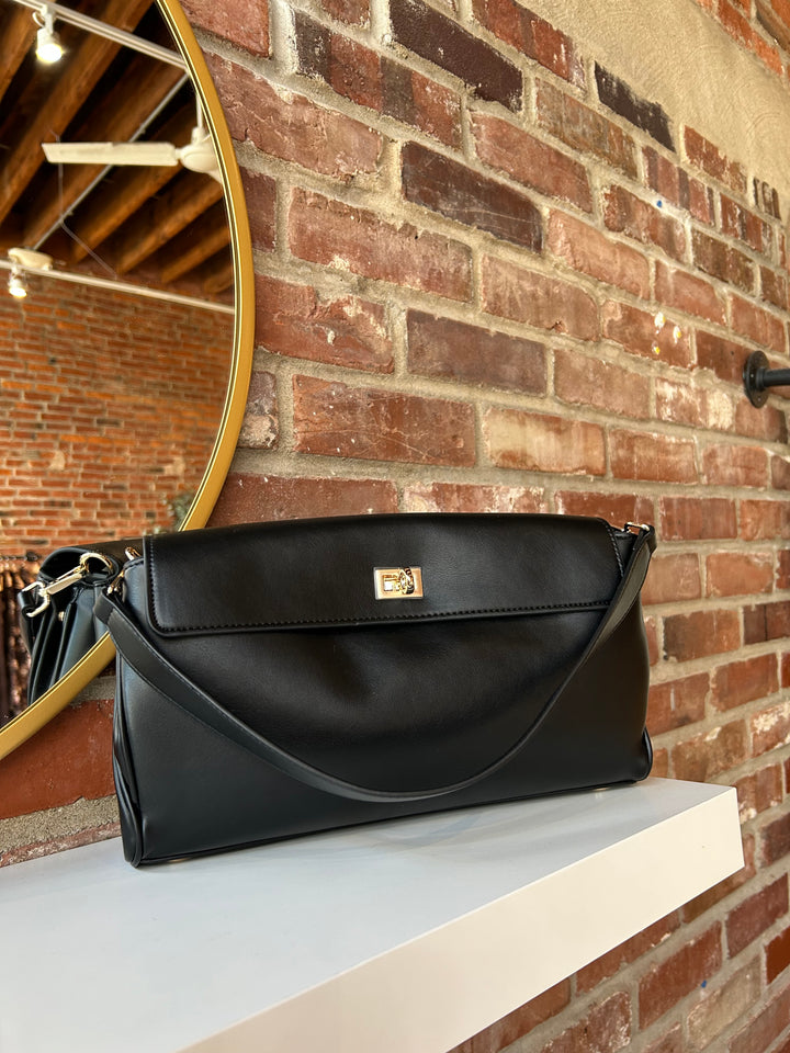 Black leather shoulder bag with metal hardware and removable shoulder strap.