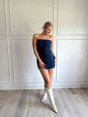 Navy blue pinstripe sleeveless mini dress with button closure. 