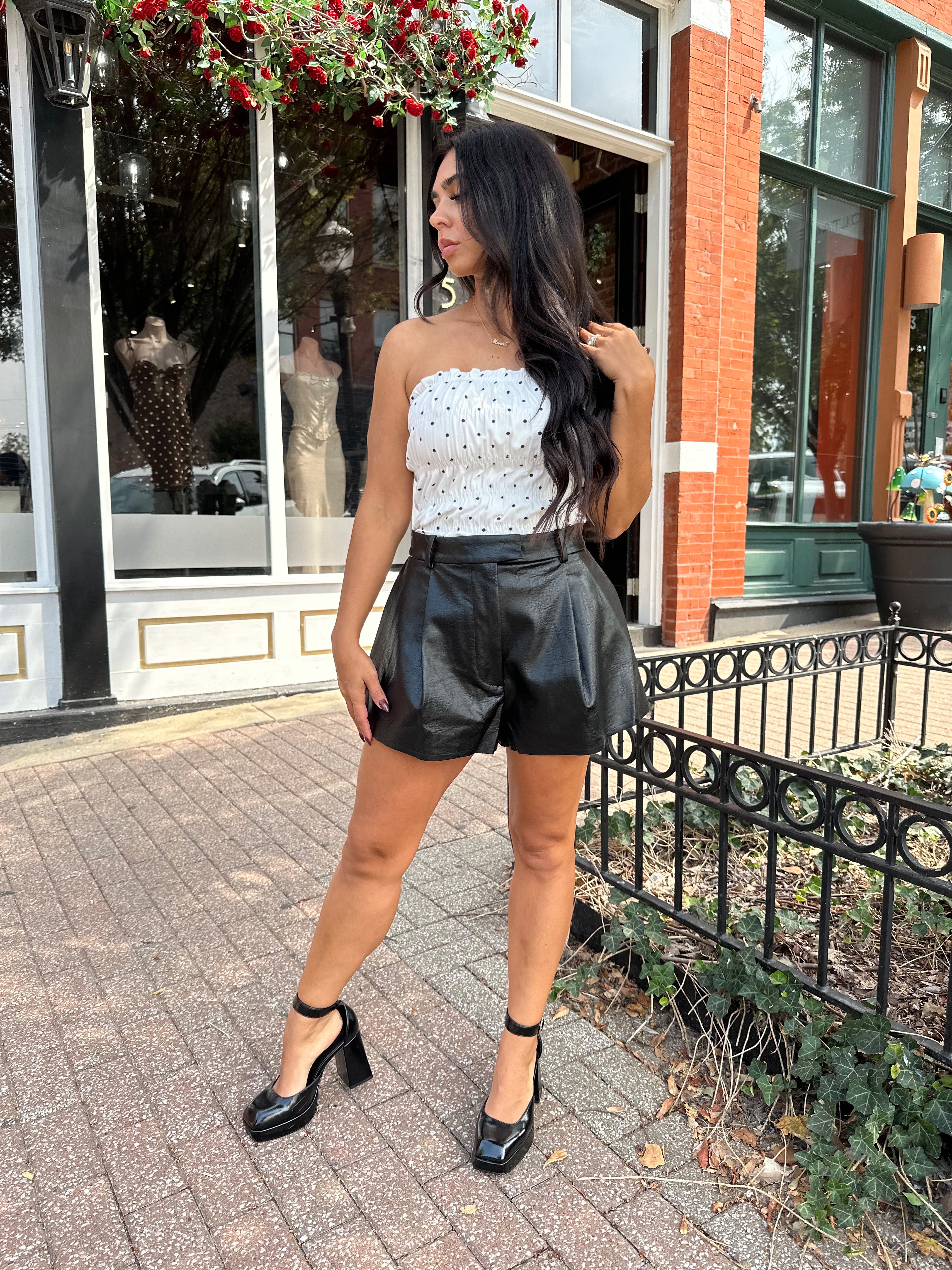 White smocked polka dot tube top with tiered elastic.
