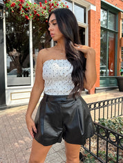 White smocked polka dot tube top with tiered elastic.