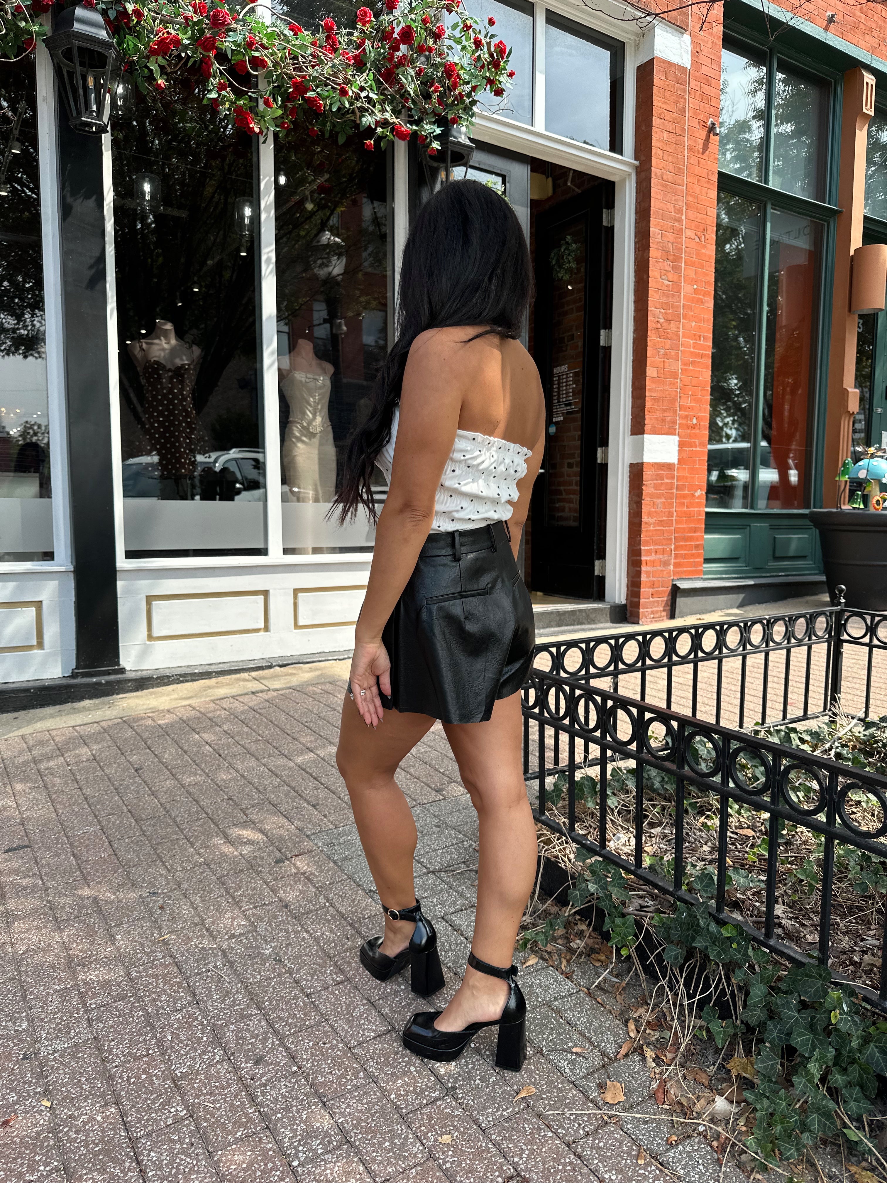 White smocked polka dot tube top with tiered elastic.