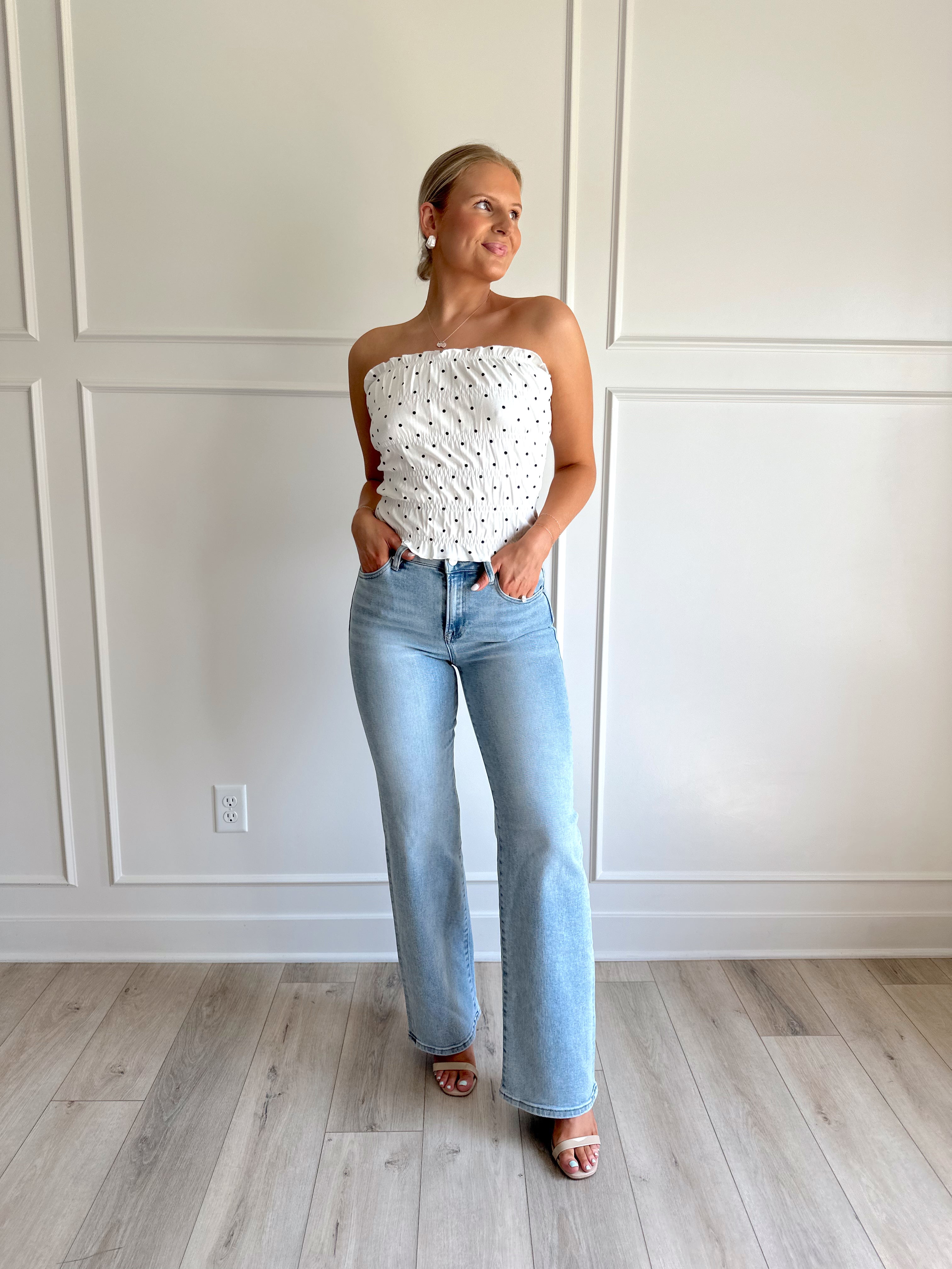 White smocked polka dot tube top with tiered elastic.
