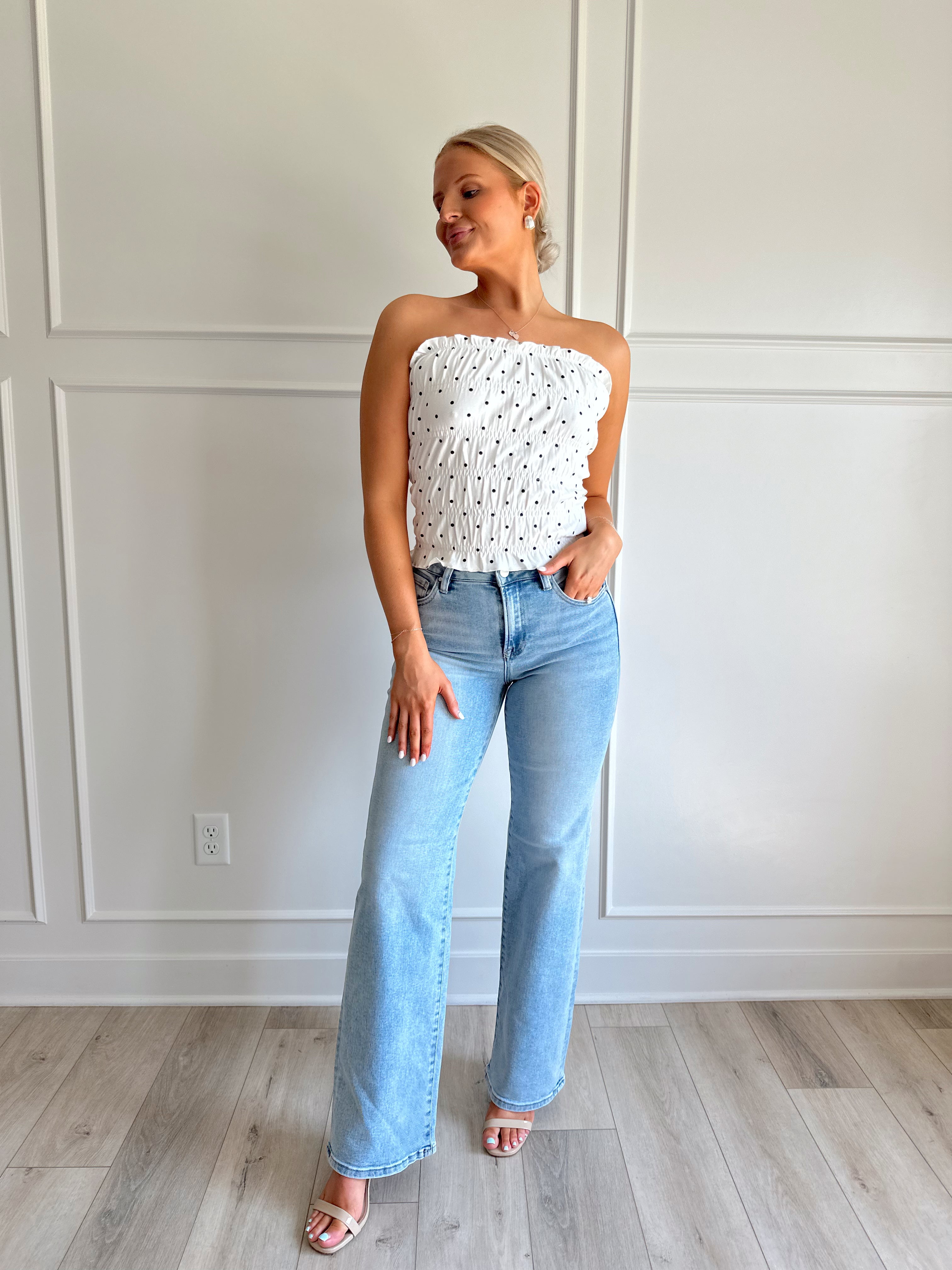 White smocked polka dot tube top with tiered elastic.