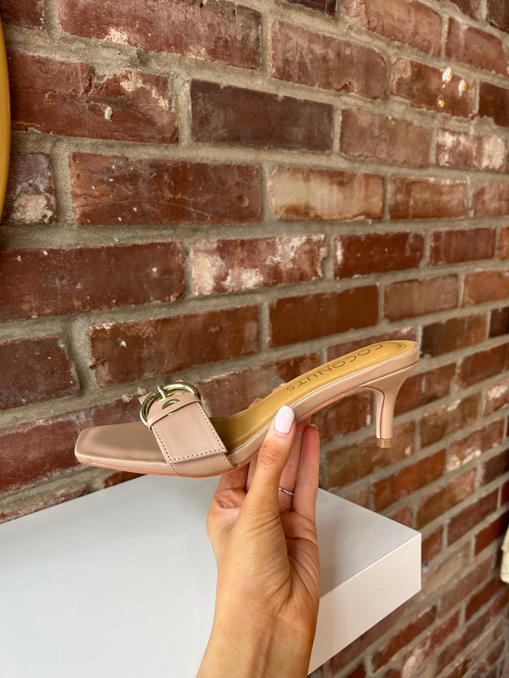 Open toed tan kitten heel with buckle detail.