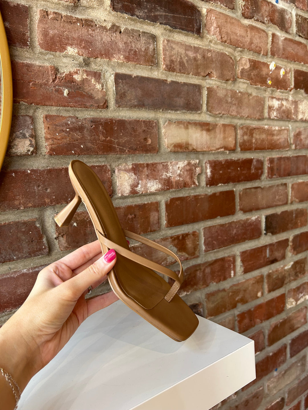 Tan flip flop kitten heel with square toe. 