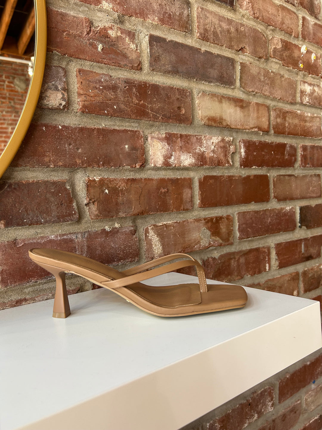 Tan flip flop kitten heel with square toe. 