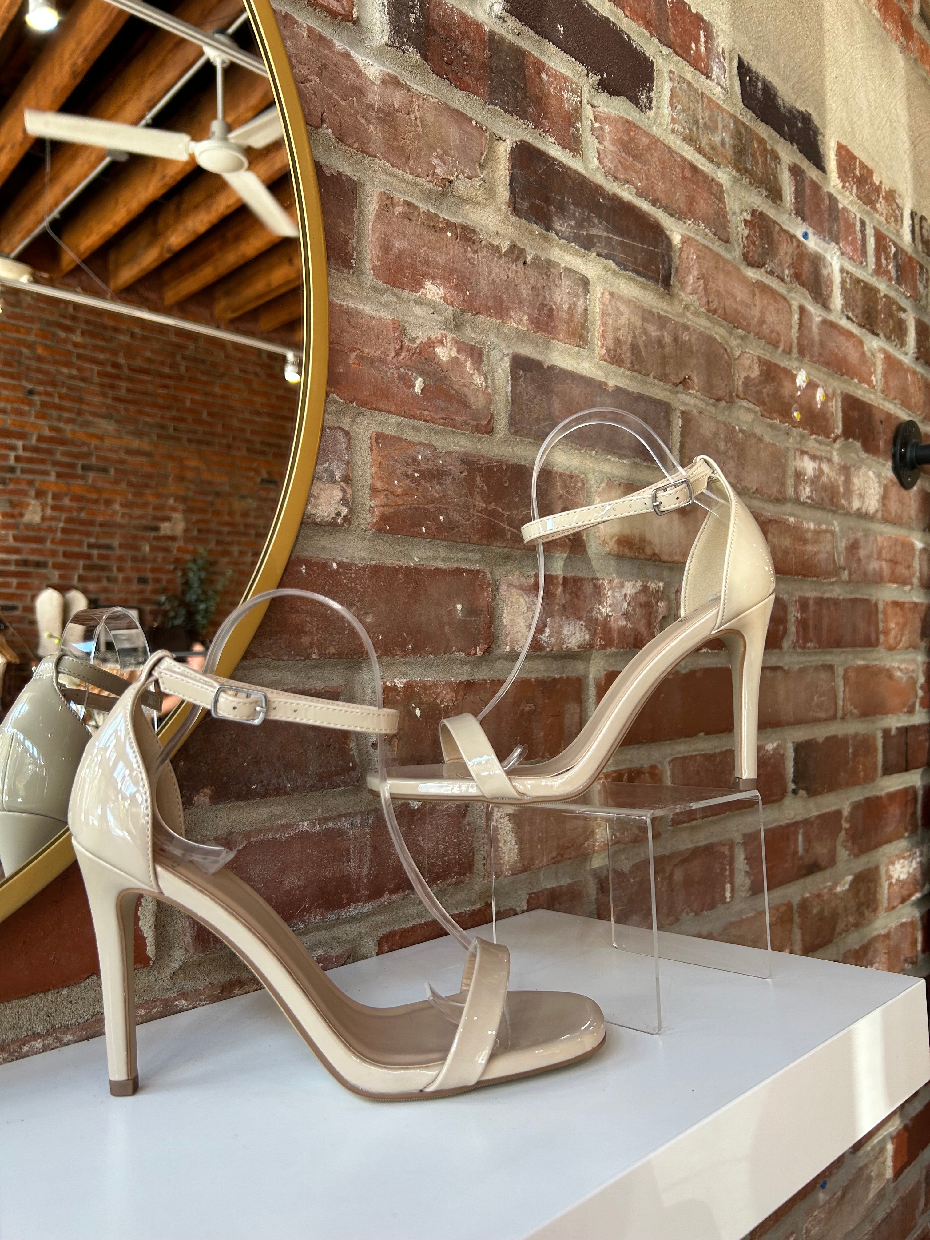 Nude patent open toe heel with slim ankle strap and stiletto high heel