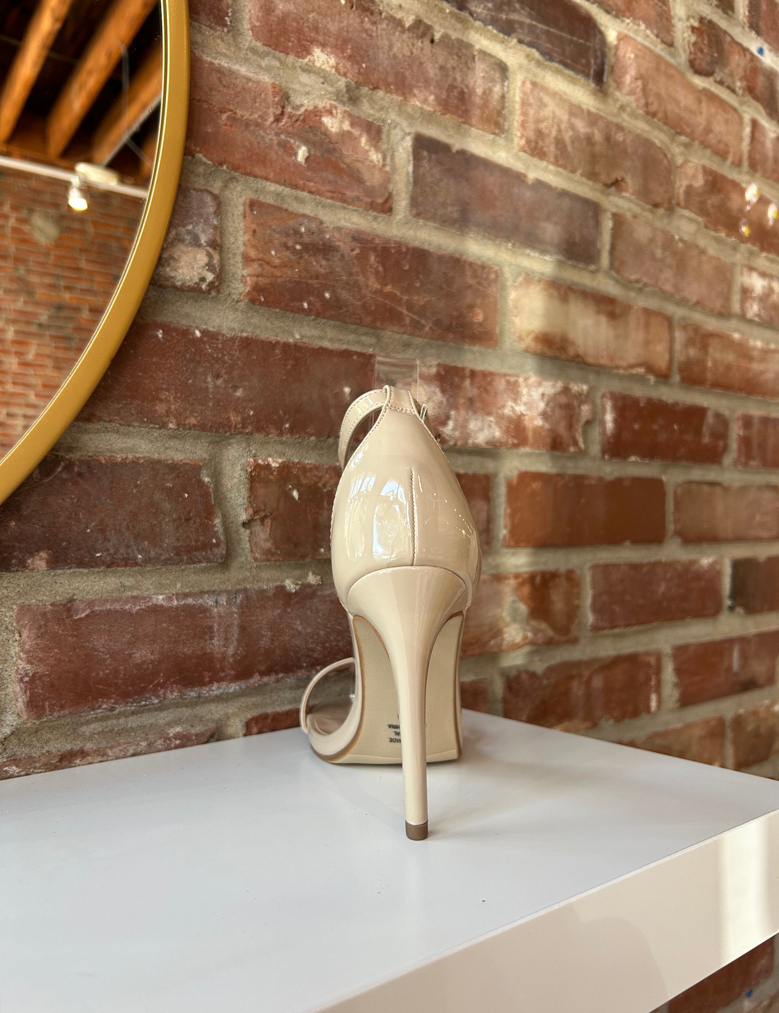 Nude patent open toe heel with slim ankle strap and stiletto high heel