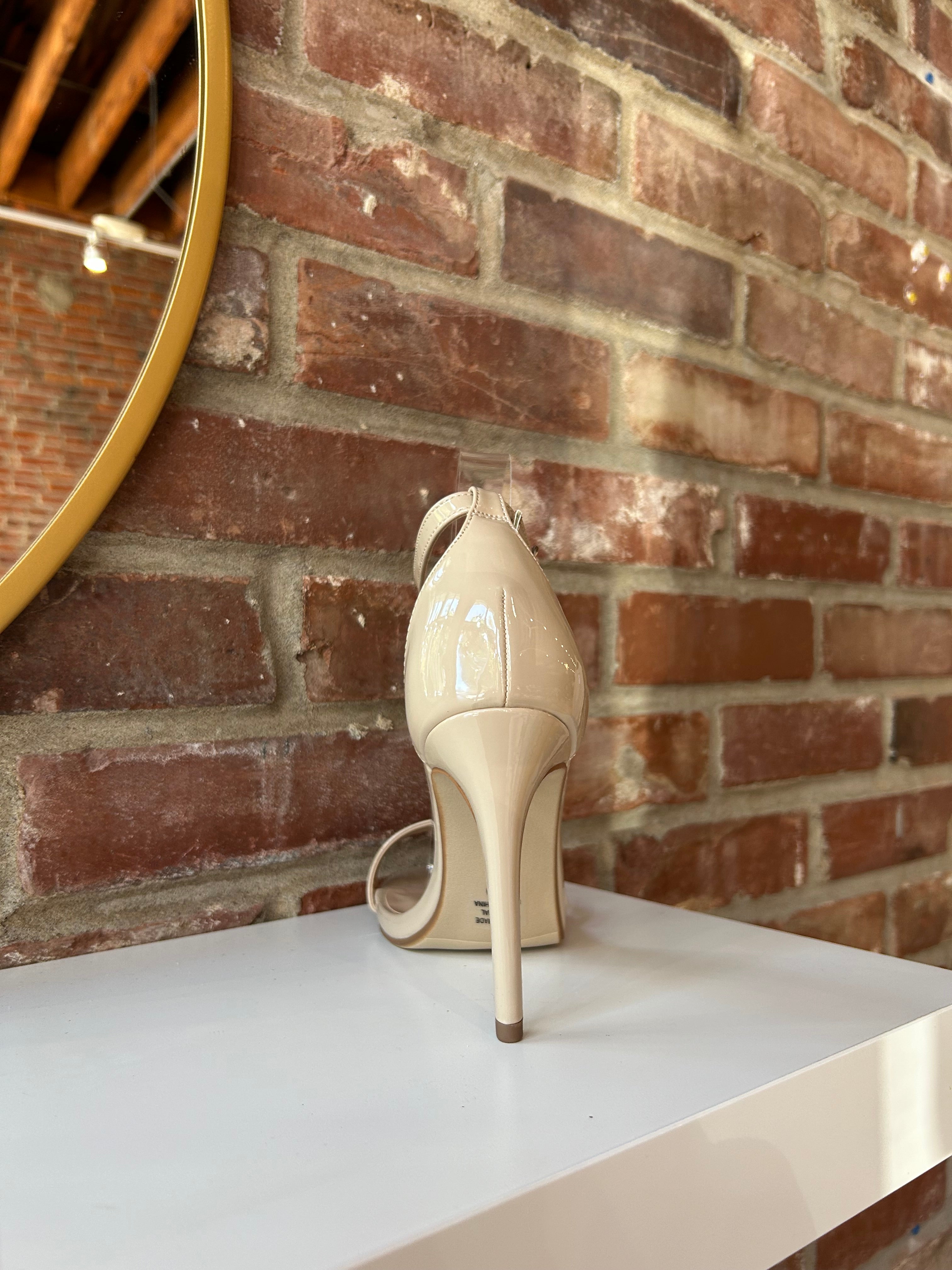 Nude patent open toe heel with slim ankle strap and stiletto high heel
