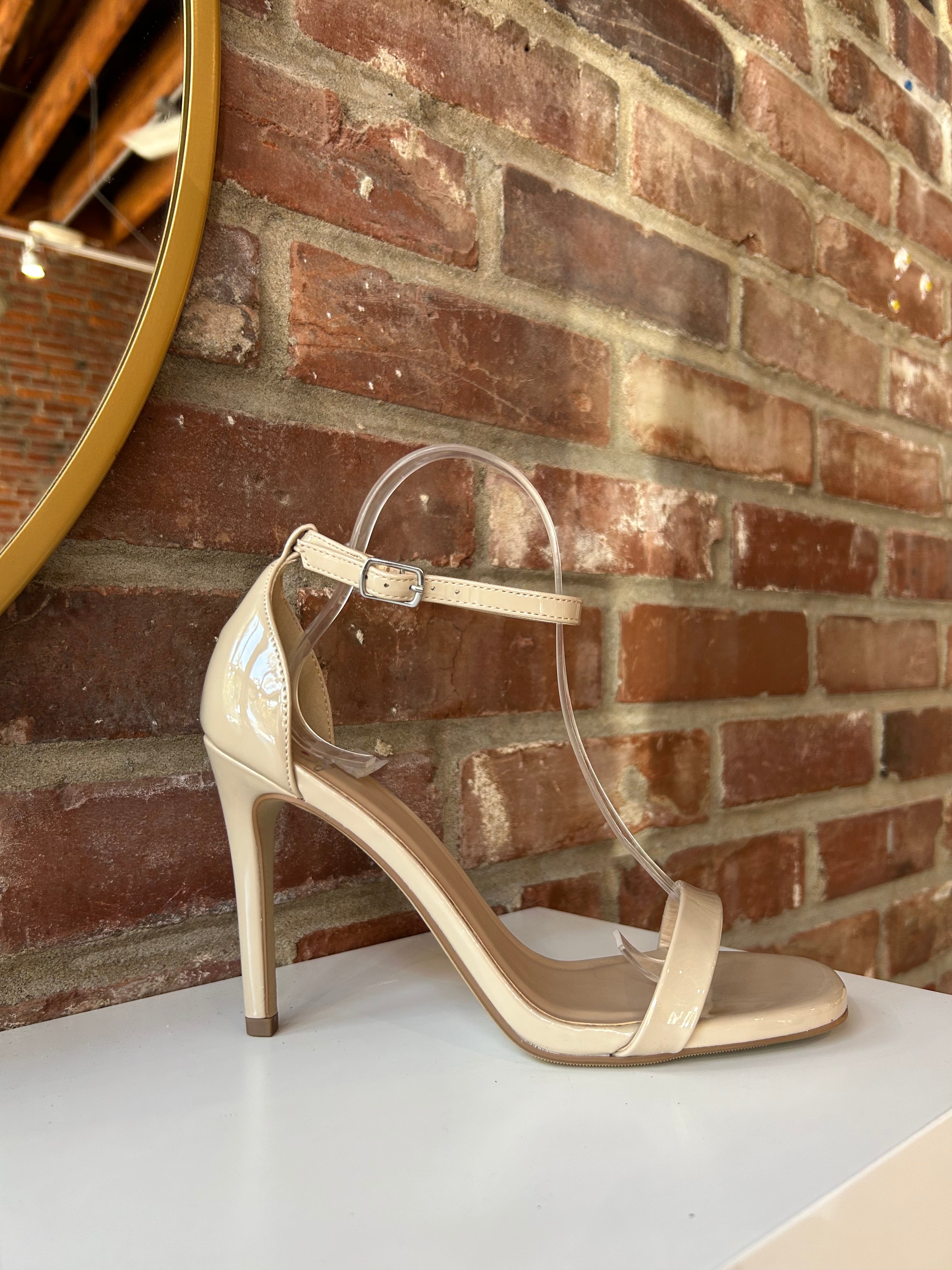 Nude patent open toe heel with slim ankle strap and stiletto high heel