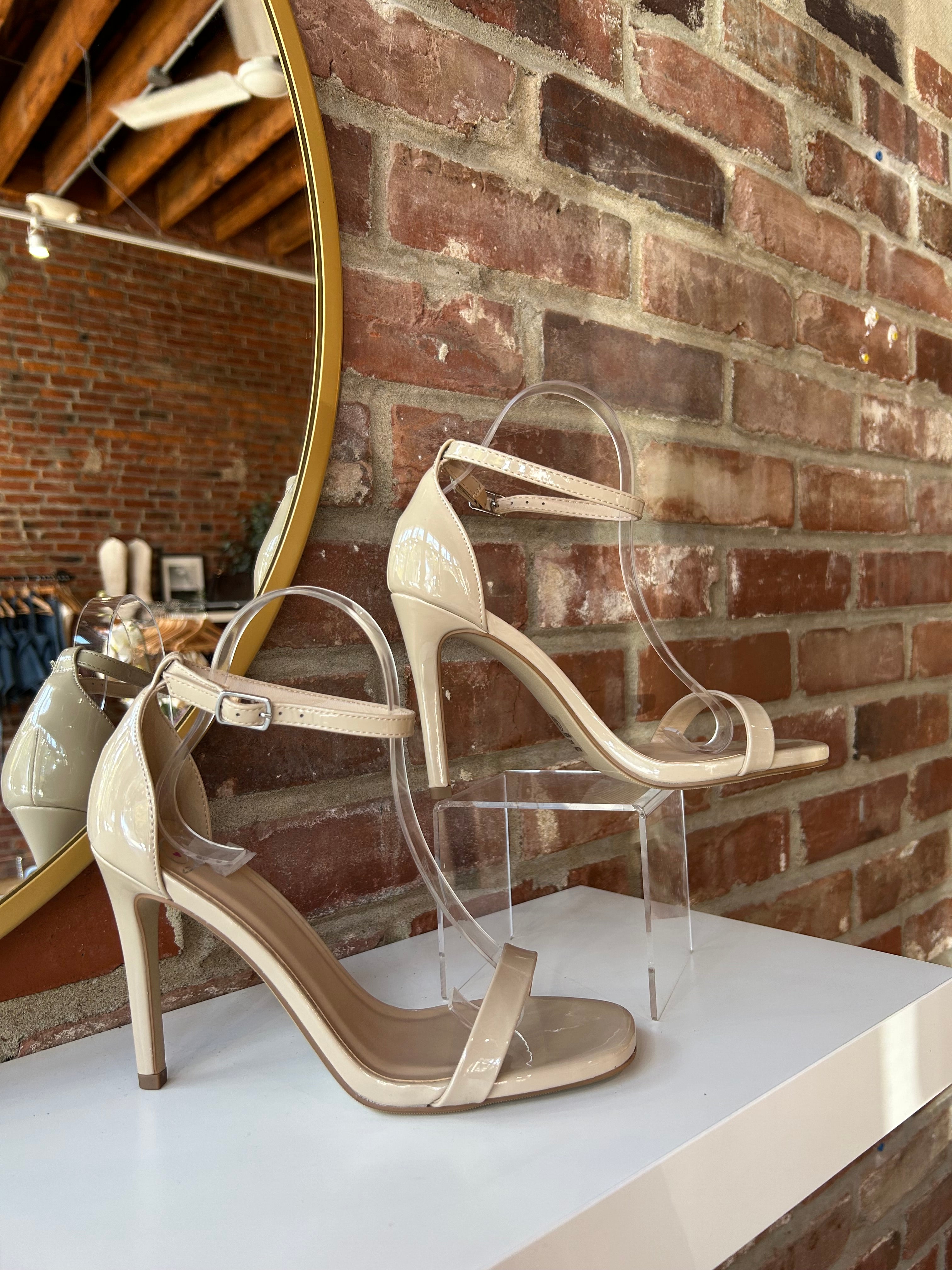 Nude patent open toe heel with slim ankle strap and stiletto high heel