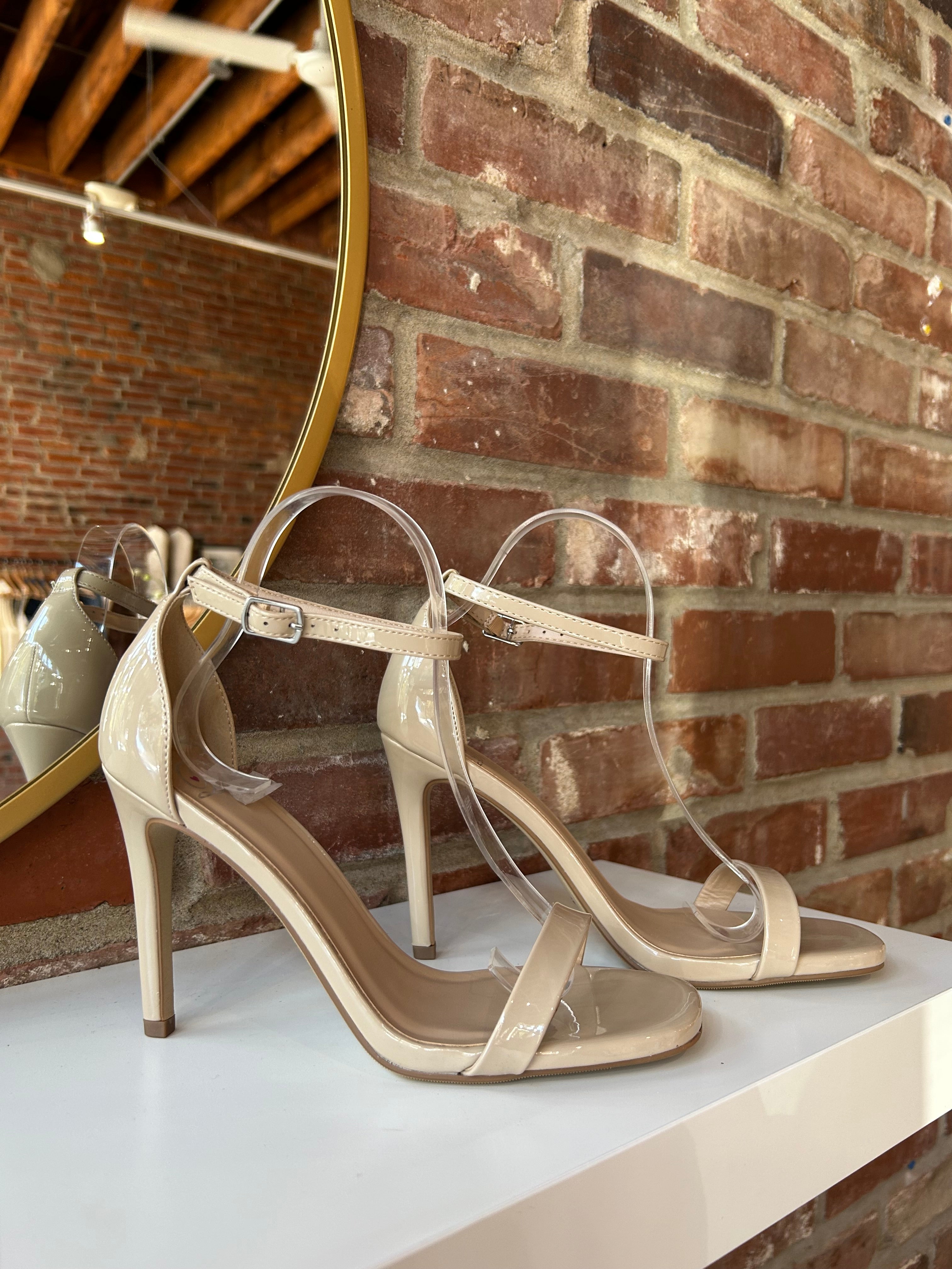 Nude patent open toe heel with slim ankle strap and stiletto high heel