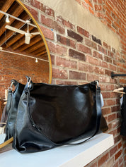 Lowen Black Leather Shoulder Bag with short shoulder strap and adjustable long crossbody strap