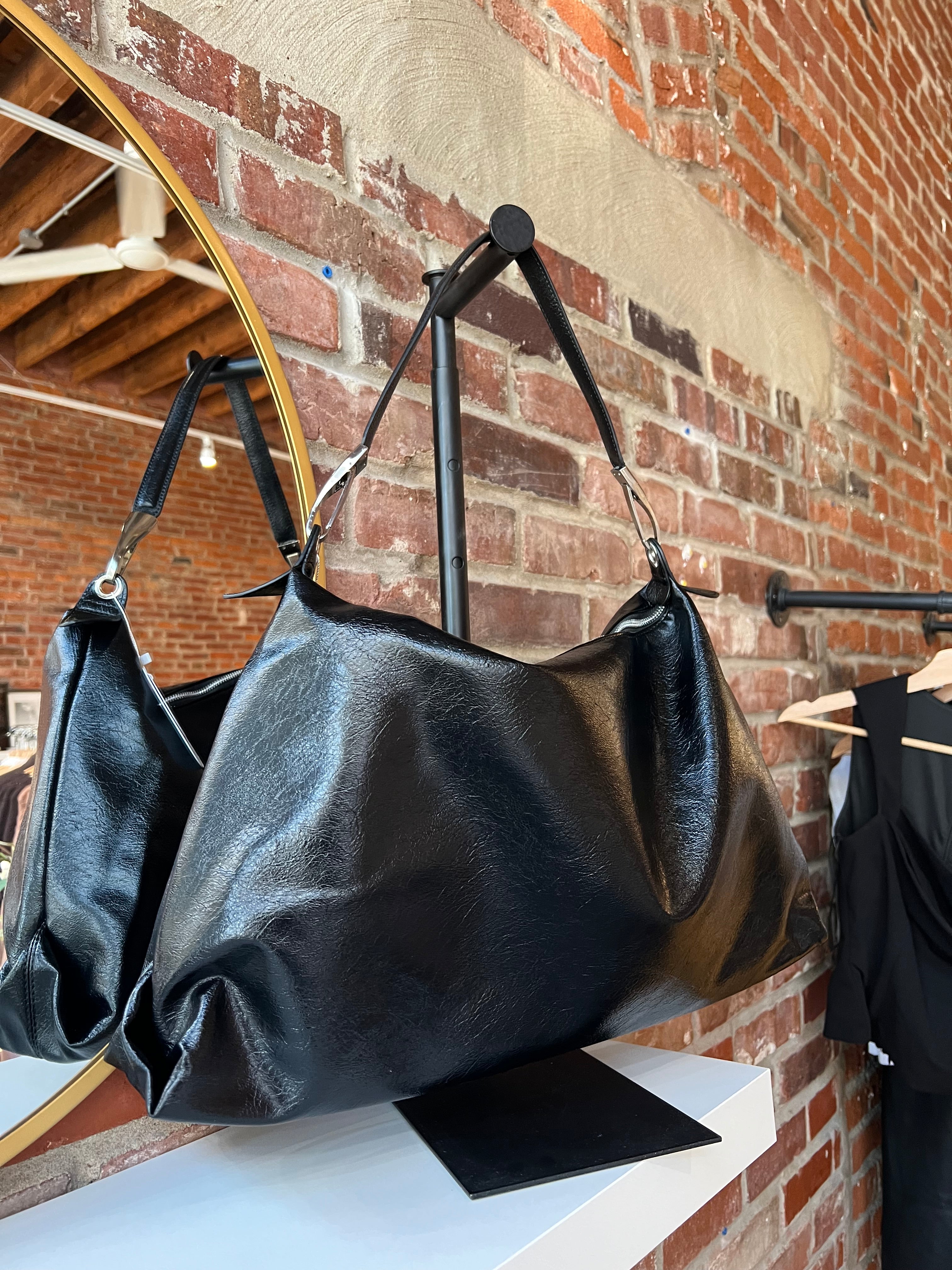 Lowen Black Leather Shoulder Bag with short shoulder strap and adjustable long crossbody strap