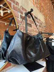 Lowen Black Leather Shoulder Bag with short shoulder strap and adjustable long crossbody strap