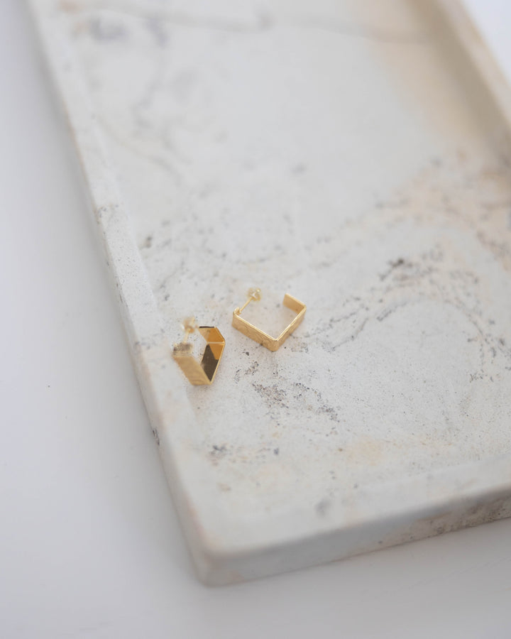 Gold plated textured square hoop earring. 