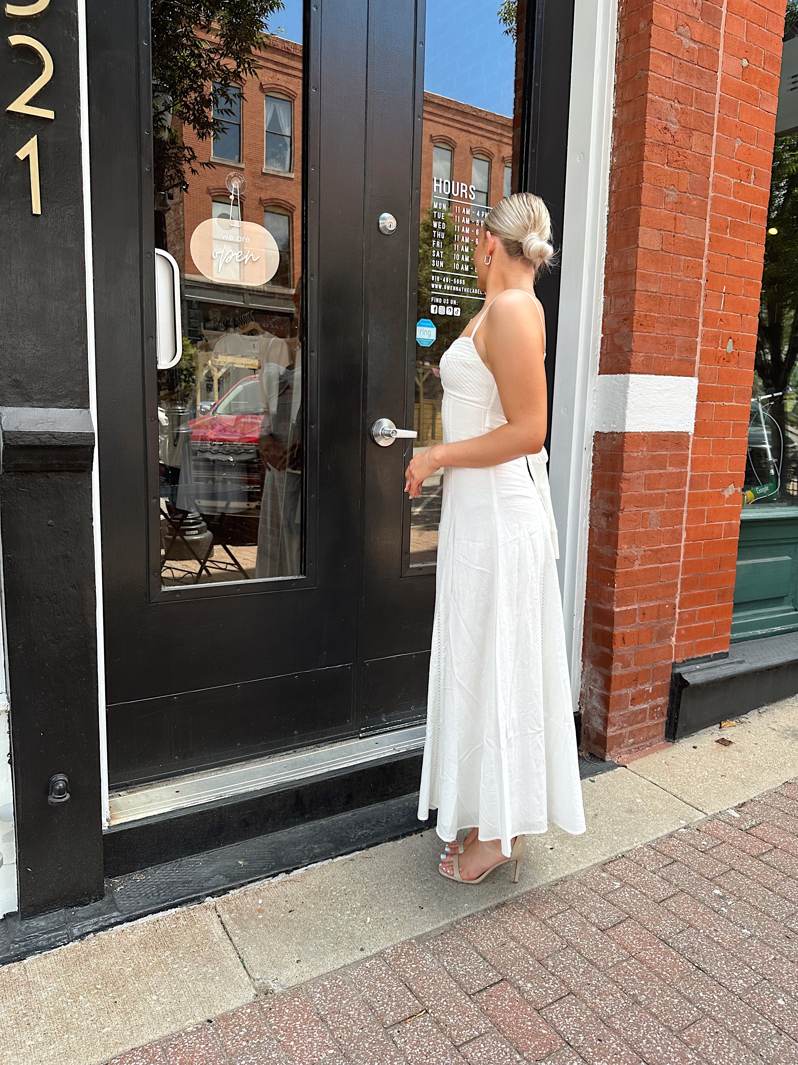 White textured eyelet maxi dress with tie back.