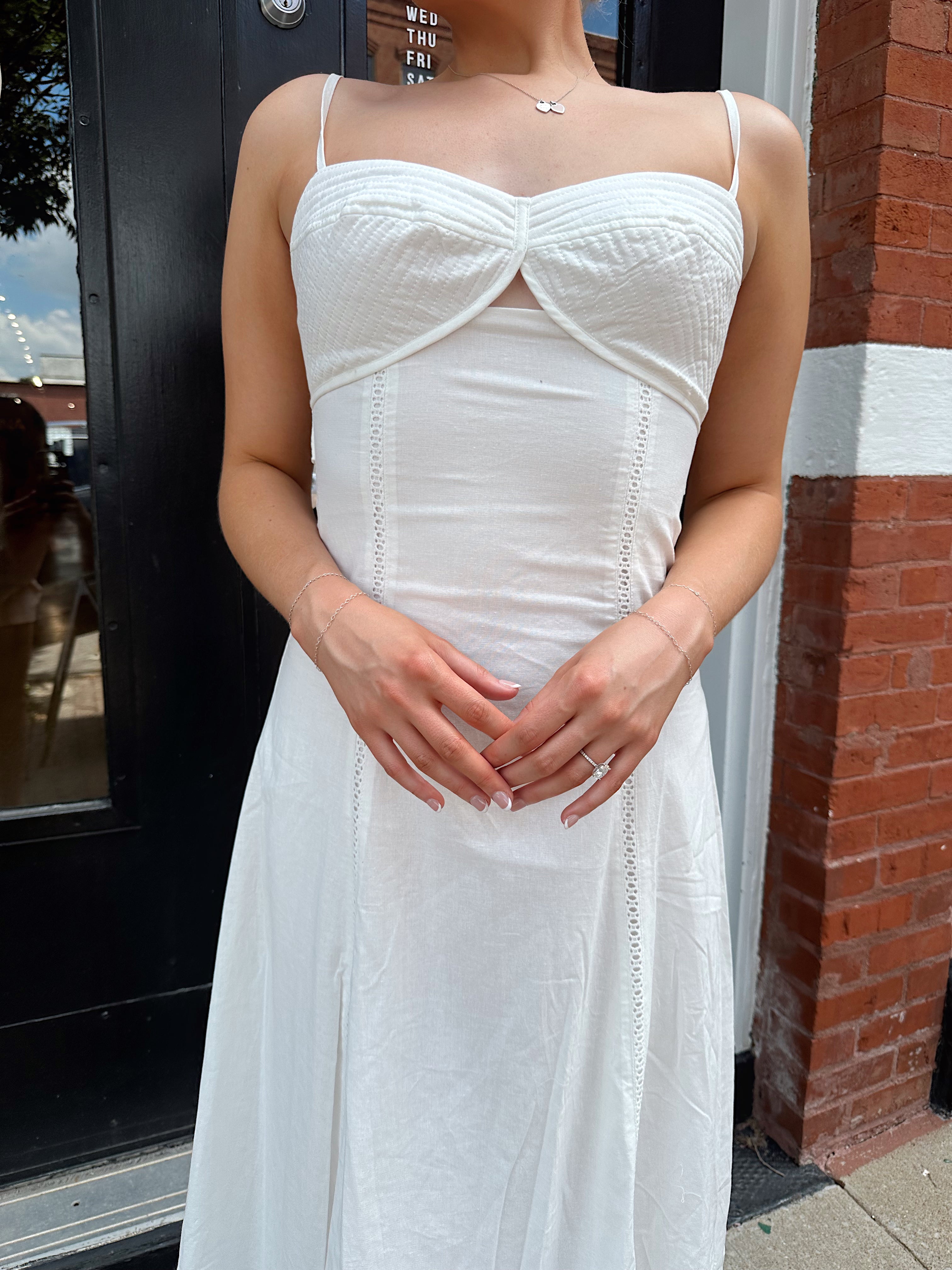 White textured eyelet maxi dress with tie back.