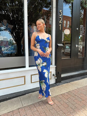 Royal blue satin midi dress with floral pattern.