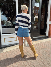 Navy and ivory striped knit long sleeve top. 