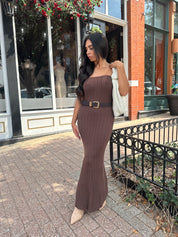 Woman wearing dark brown textured strapless maxi dress. Perfect for fall.