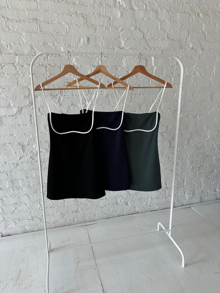 Black, navy, and green active wear mini dress.