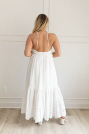 White maxi dress with eyelet embroidered pattern. Adjustable for straps. Also comes in lavender. 
