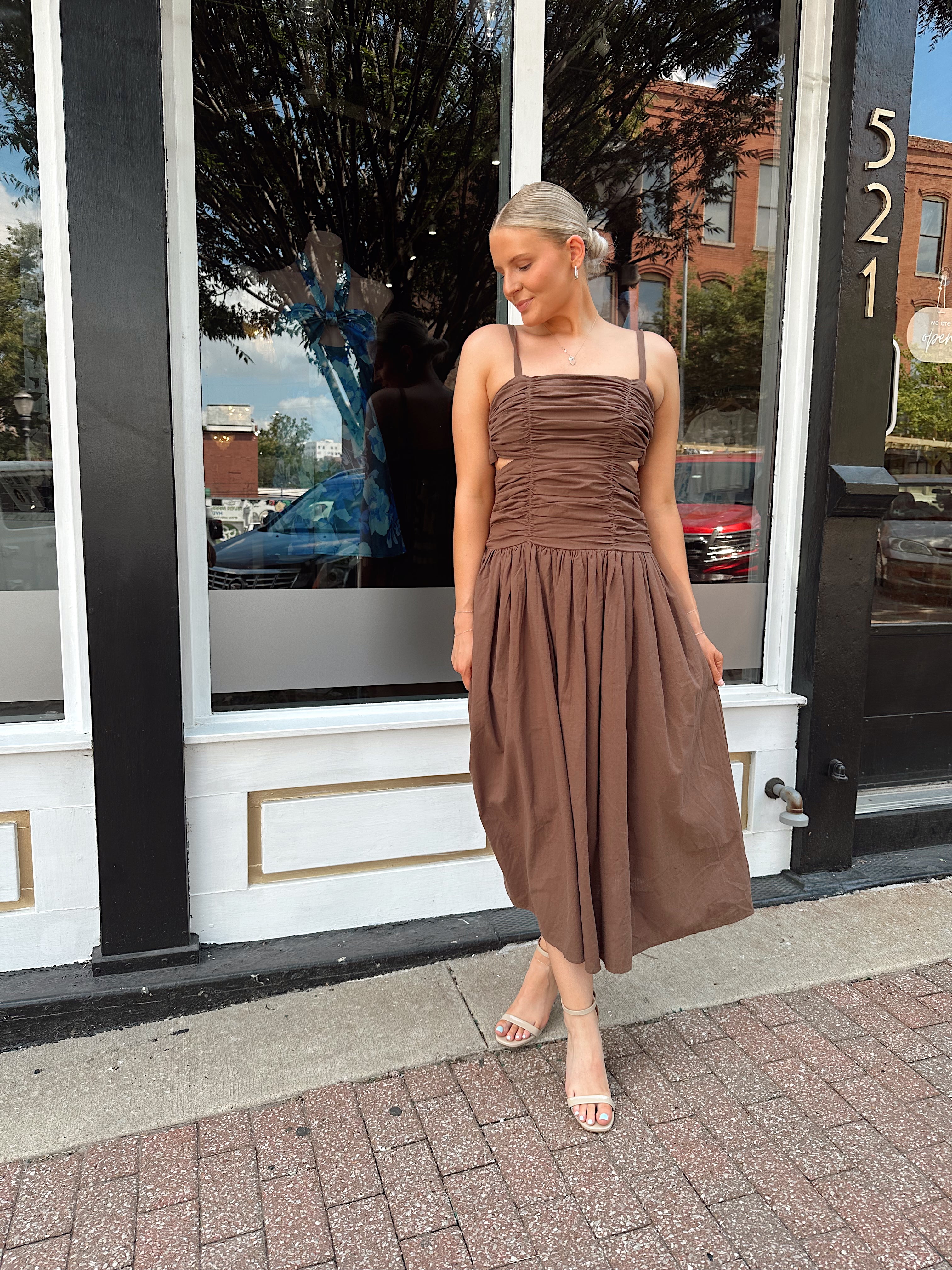 Brown linen ruched midi dress with cutout detail and open back.