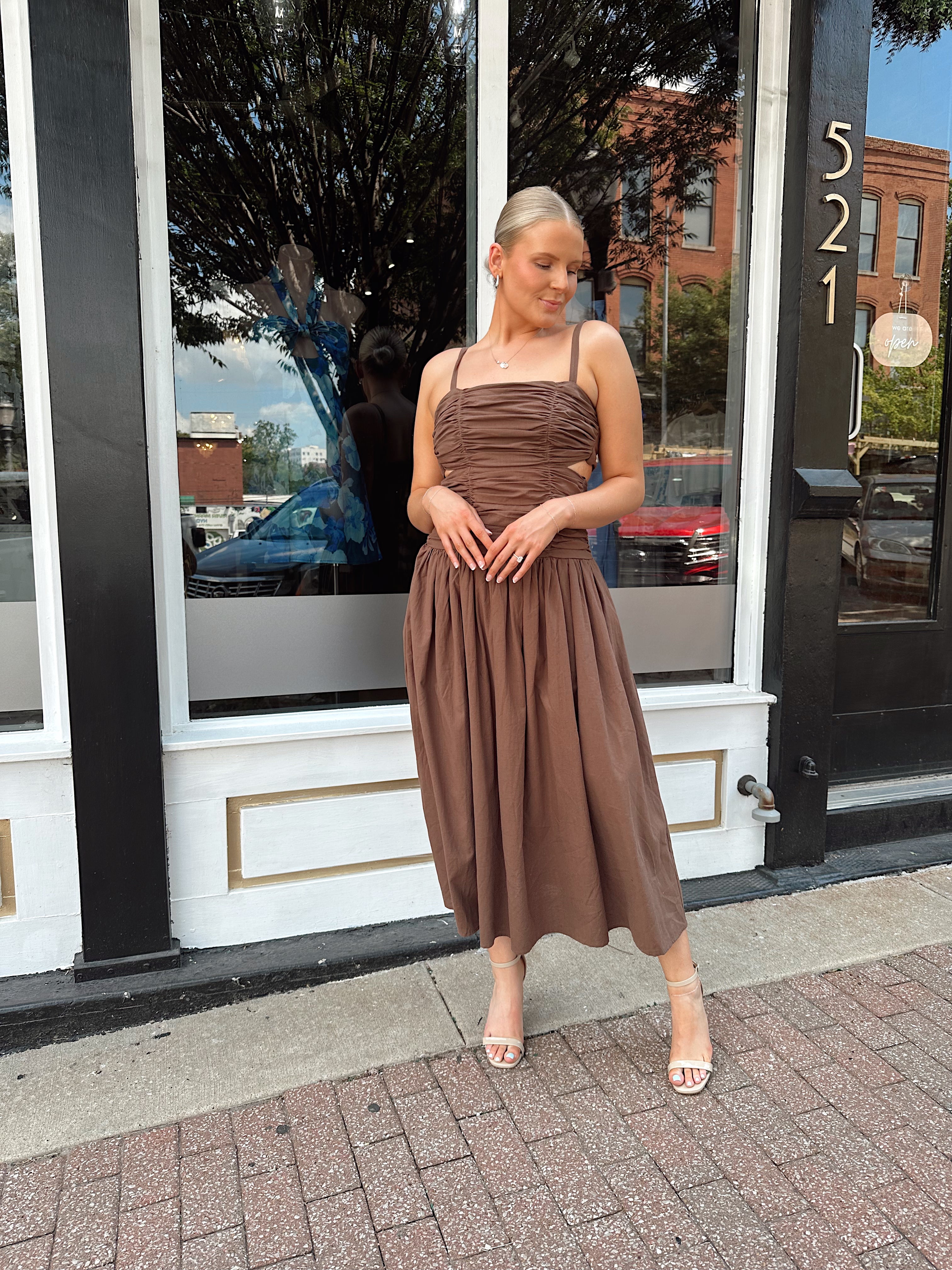 Brown linen ruched midi dress with cutout detail and open back.