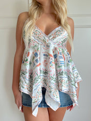 Satin halter top with a European village print vibe.