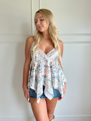 Satin halter top with a European village print vibe.