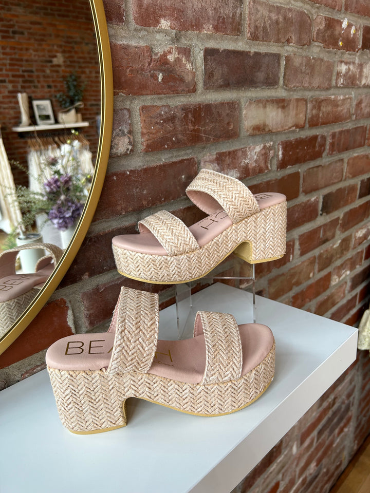 Woven platform heel with subtle shimmer.