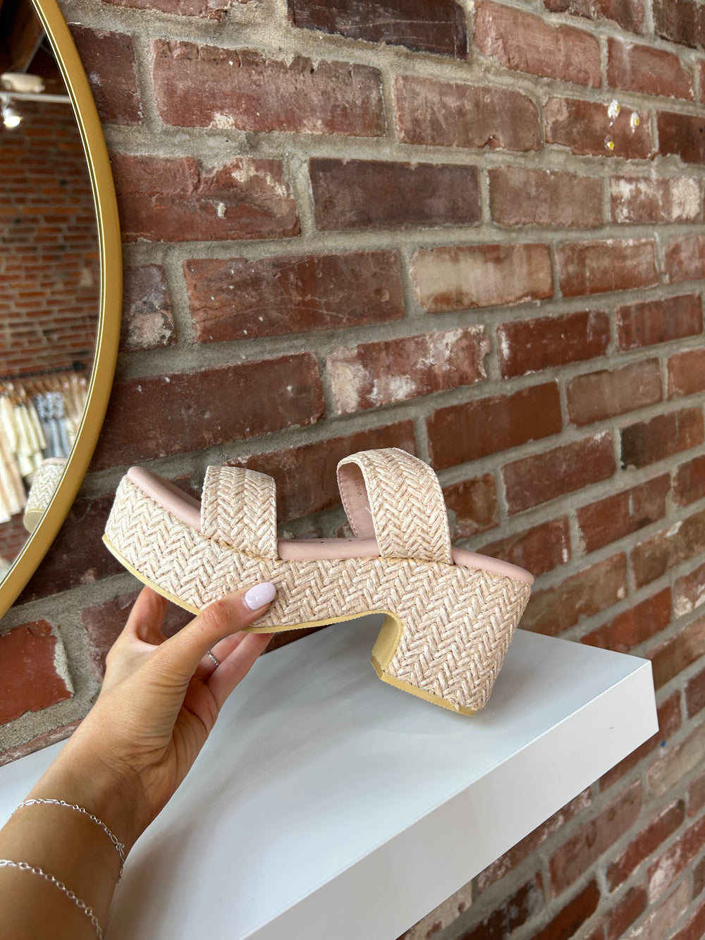 Woven platform heel with subtle shimmer.