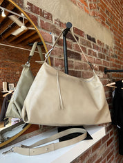 Palmer Beige Leather Shoulder Bag with short shoulder strap and adjustable long crossbody strap