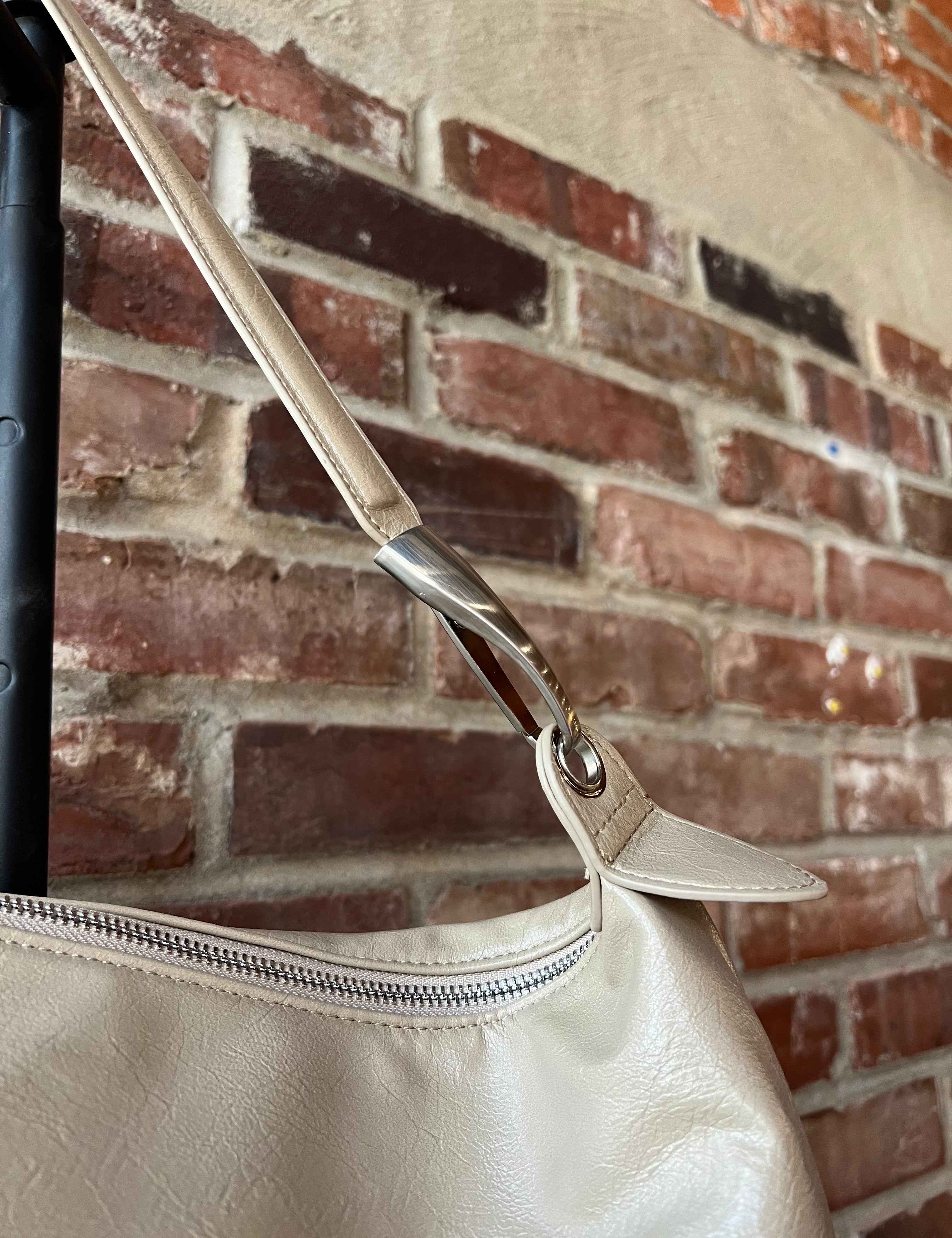 Palmer Beige Leather Shoulder Bag with short shoulder strap and adjustable long crossbody strap