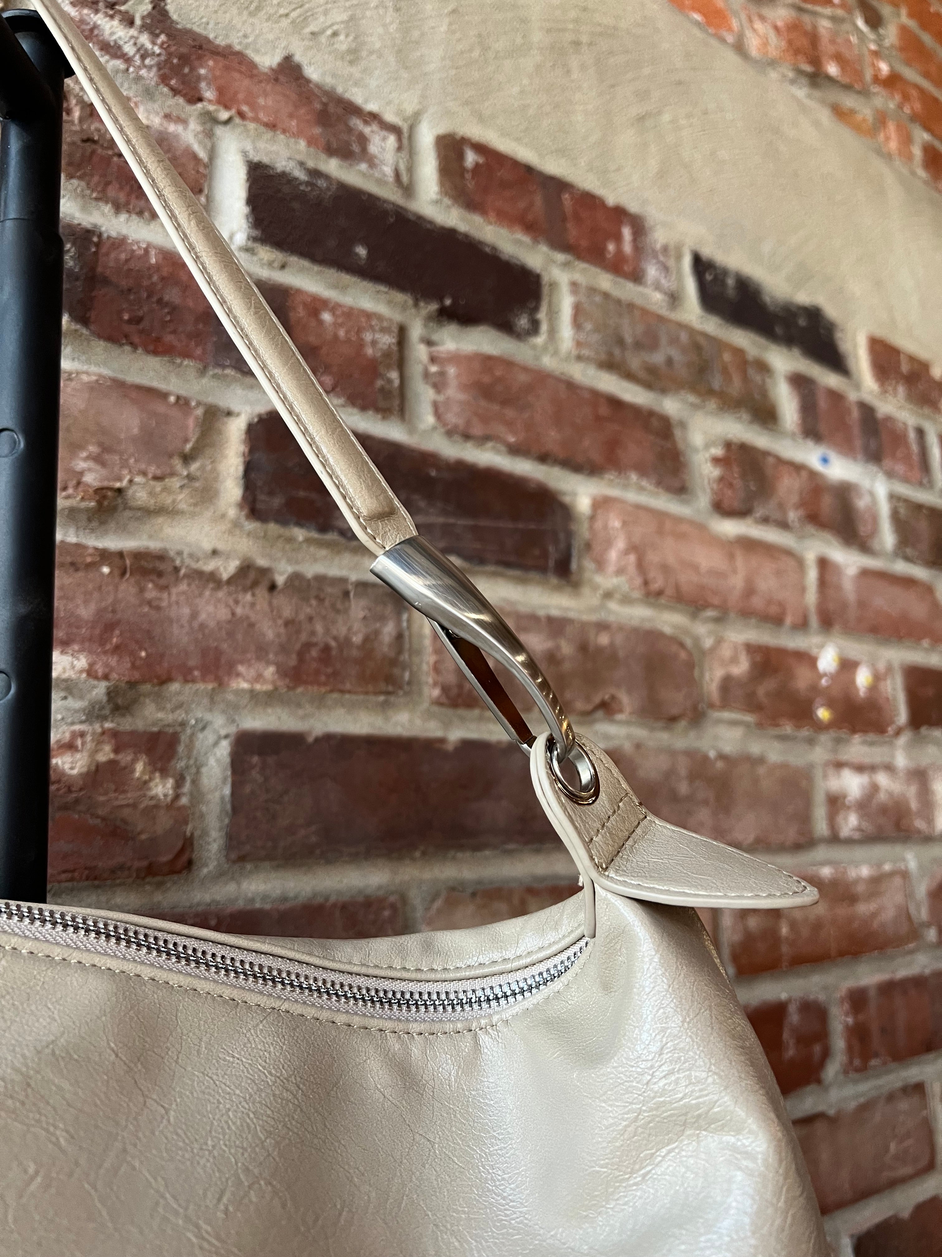 Palmer Beige Leather Shoulder Bag with short shoulder strap and adjustable long crossbody strap